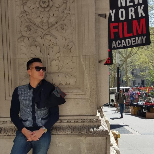Elroy Lee, Executive Producer at LightFlux Productions, looking quietly off-camera.